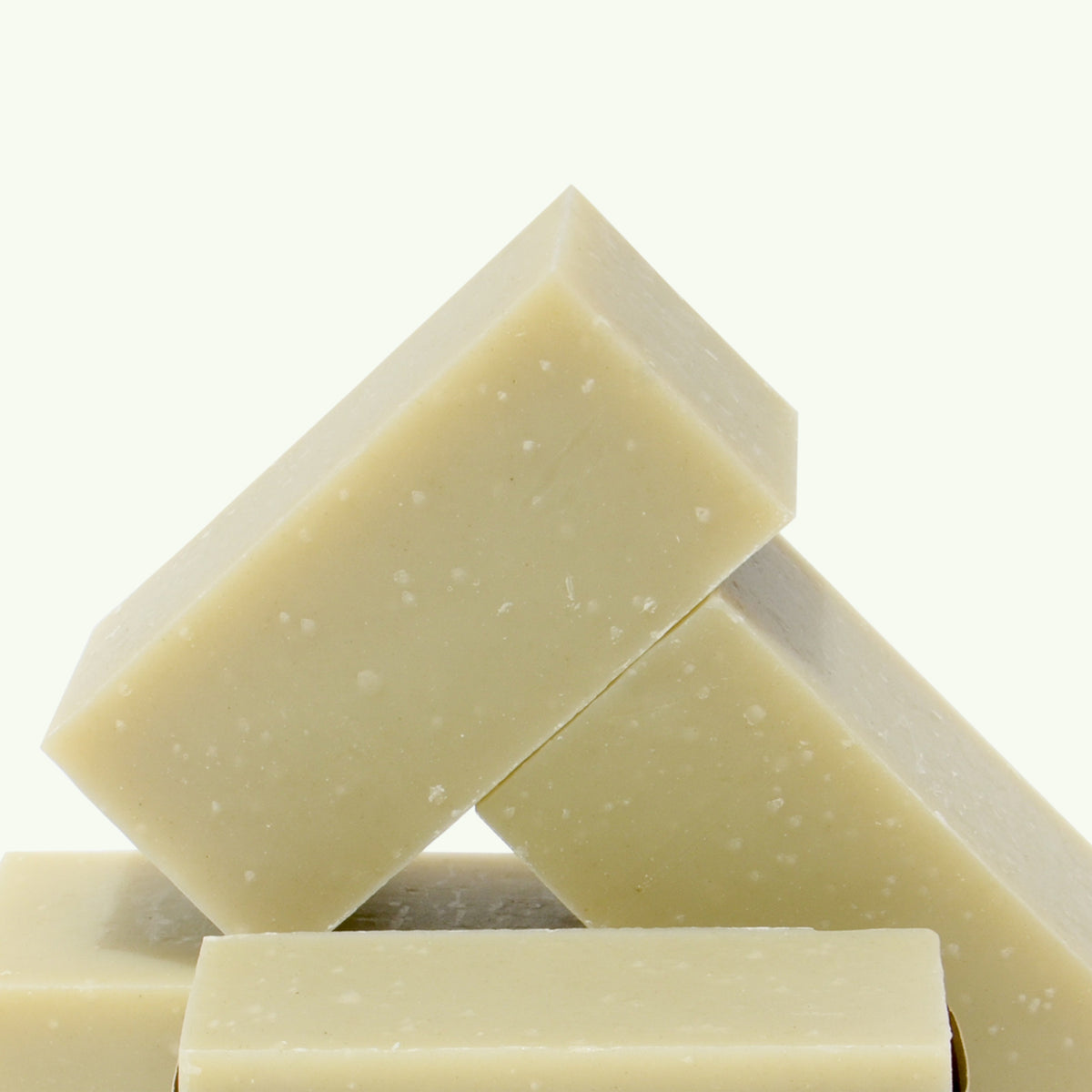 Soap Bar - 6 Scents, All Natural Bar Soap, Vegan, Plastic Free, 6oz Lavender Peppermint cream colors soap bricks stacked on top of each other.