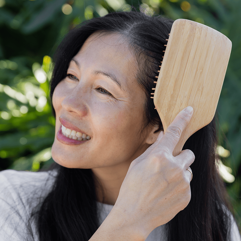 DEC2024_ZWS_ProductwithModels_BambooHairBrush_cropped_960px.png__PID:2099979e-a957-44ab-a768-a6dd9897ef35