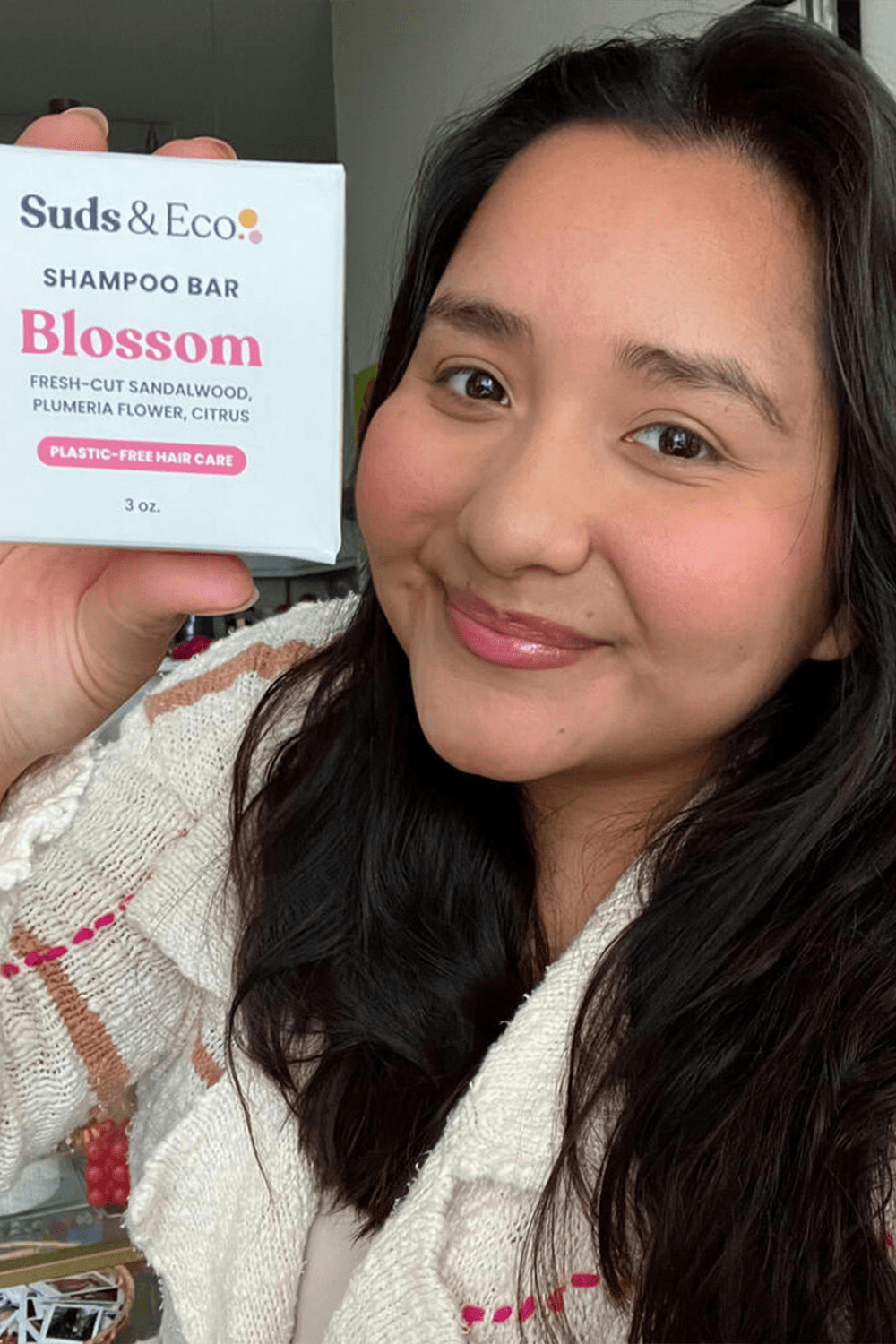 girl showcasing shampoo bar