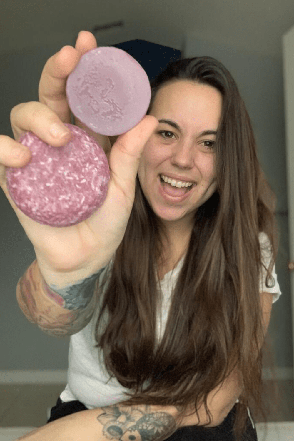 jazmine showcasing shampoo and conditioner bars