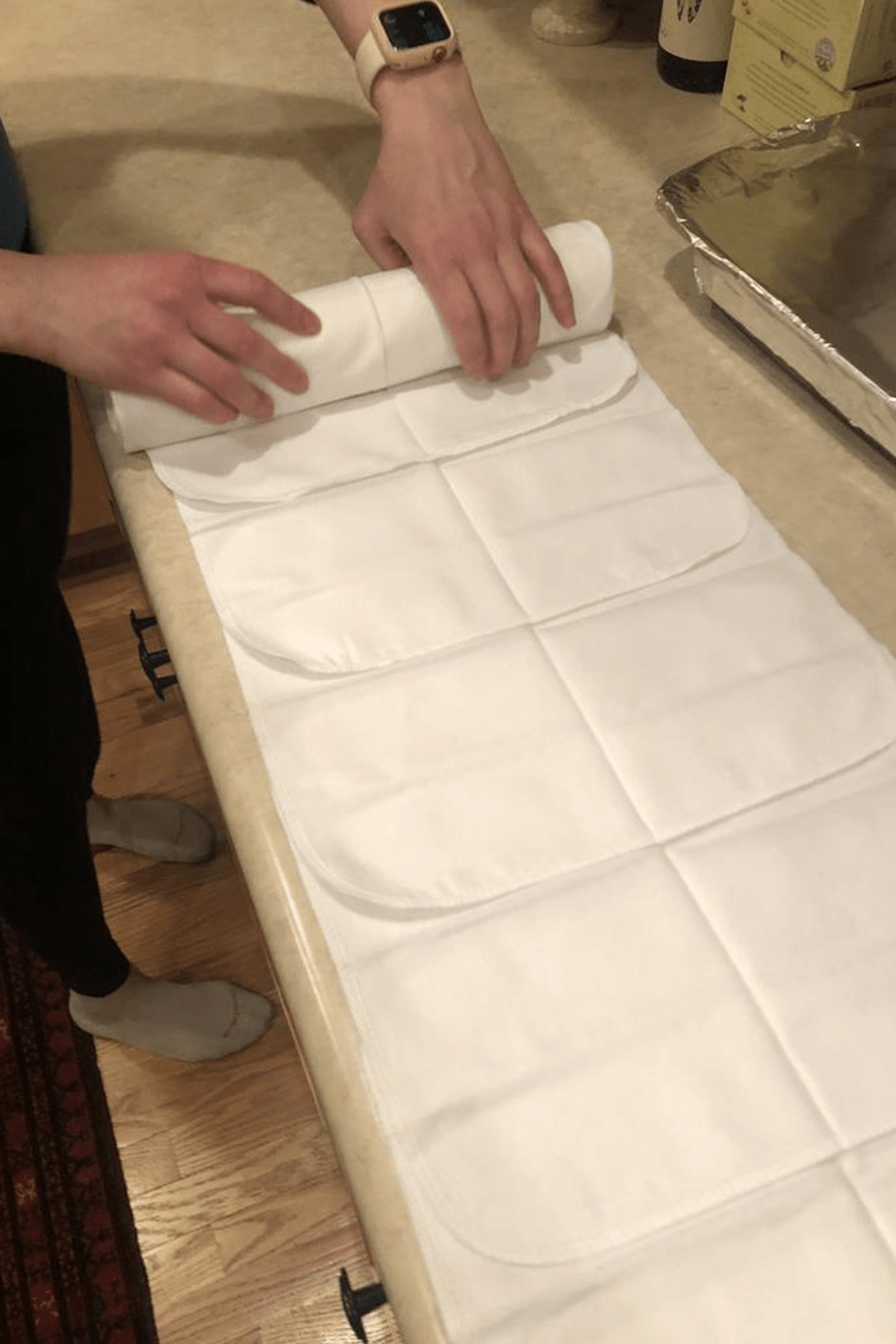 rolling up reusable paper towels